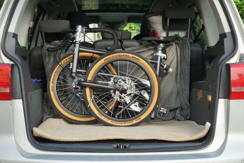 VELLO folding bike in the trunk of a car